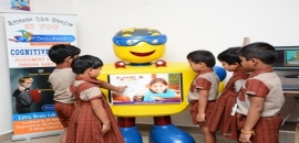 Our KG students working with Robot in Skill Angels Lab